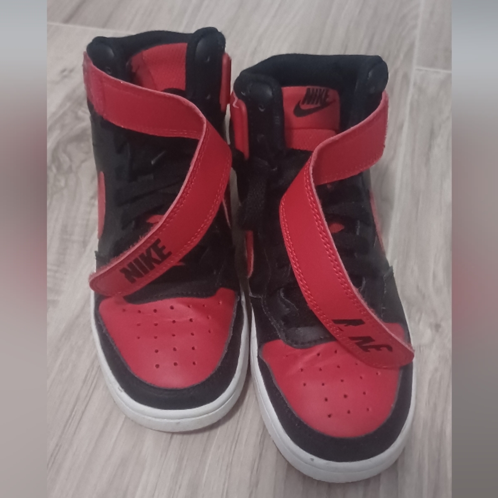 Red and black children nike
